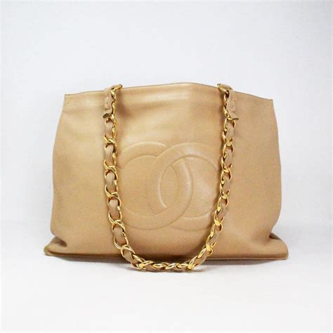 chanel black tote with gold chain|chanel black canvas tote.